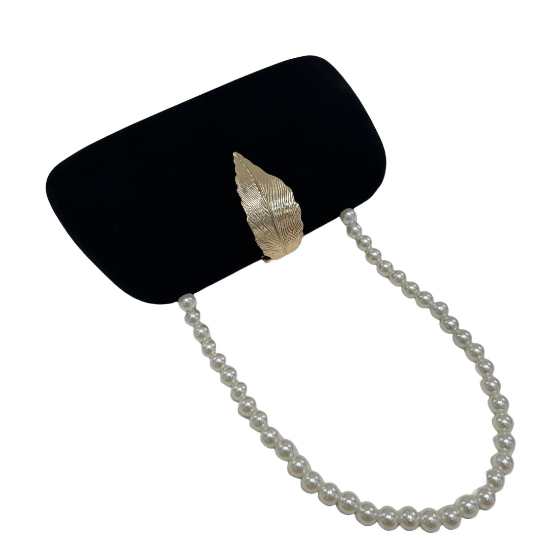 Cross-border spot hand-held dinner bag, box bag, fine flash leaf decorative dress bag, black flannel banquet bag.